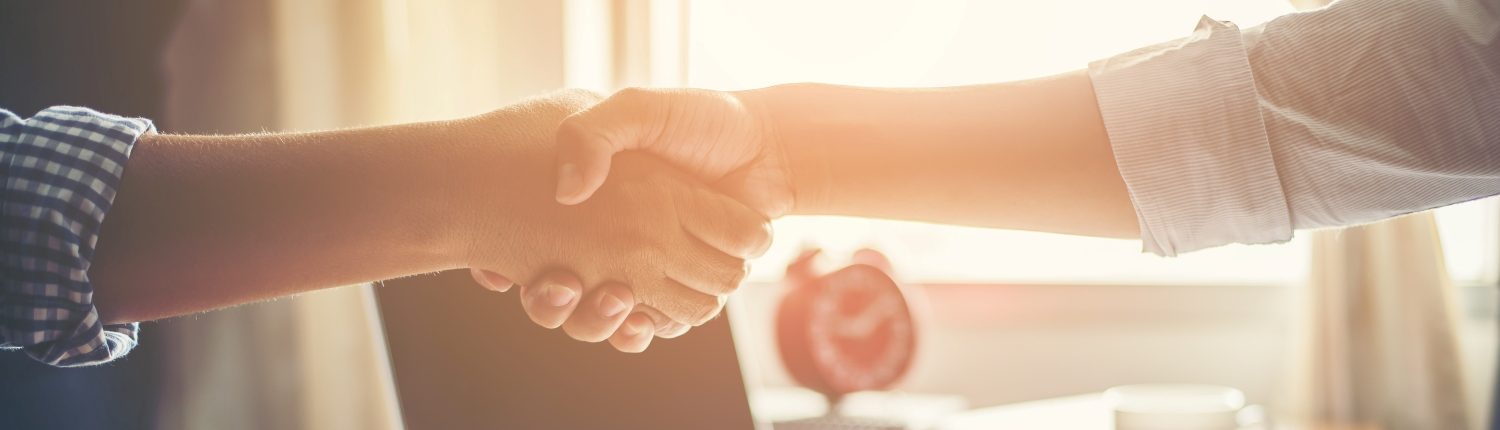 Business People Handshake Greeting Deal at work.